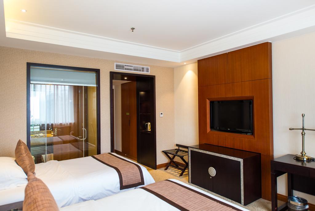 Vienna International Hotel - Expo Branch Shanghai Esterno foto